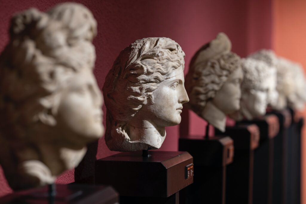 A row of ancient busts on display in the Acropolis Museum which is one of the top things to see in Athens.