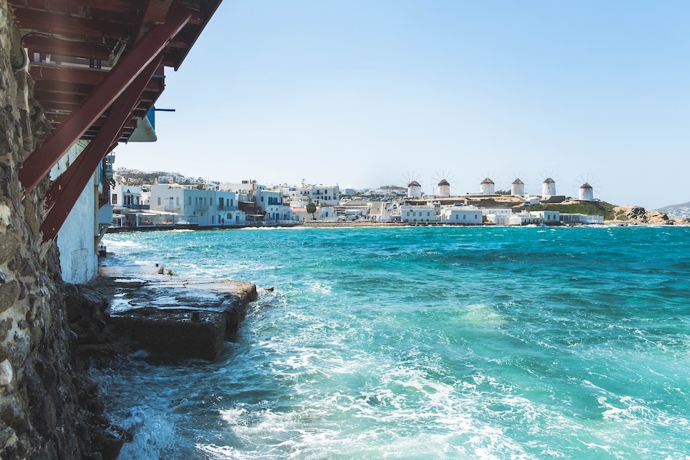dive into the clear waters of Greece when you take a direct flight from the US 