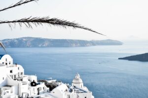Contrastingwhite buildings with blue sea of a Greek island you can fly to from Dubai.
