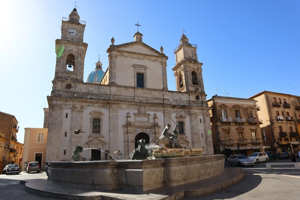 Caltanissetta cathedral with fountain in front spurting water