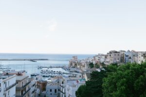 Palermo is located on the North coast of Sicily, bordered by the sea