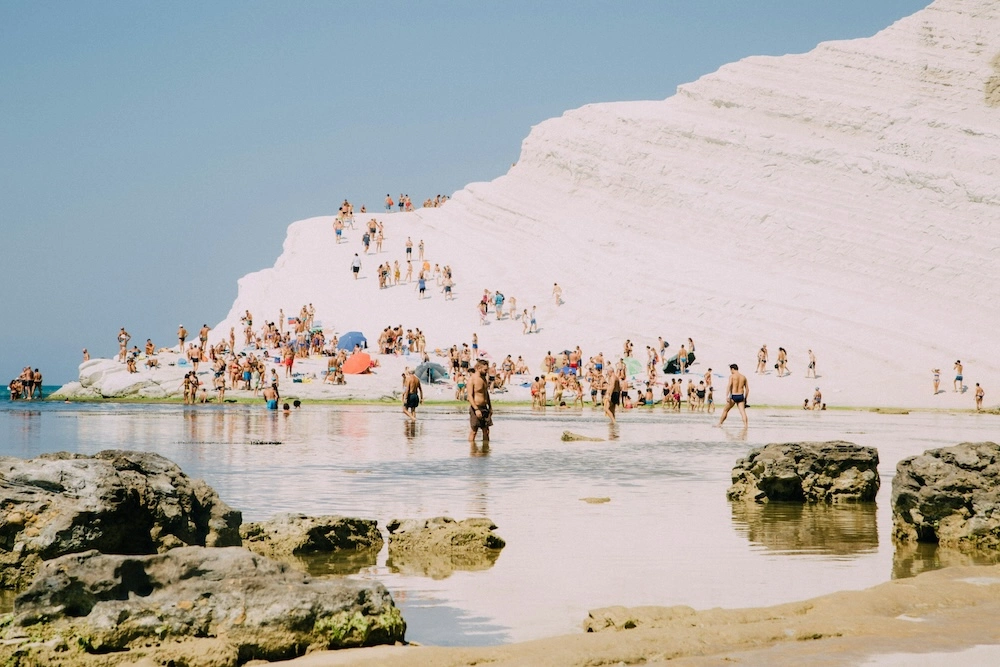 Vacationers enjoy the pale sand beaches and good weather of Agrigento